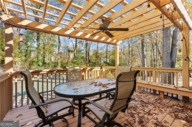 wooden deck with a pergola and ceiling fan