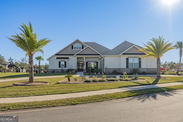 view of front of property with a front lawn