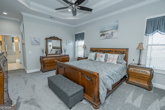 carpeted bedroom featuring ceiling fan, crown molding, and multiple windows