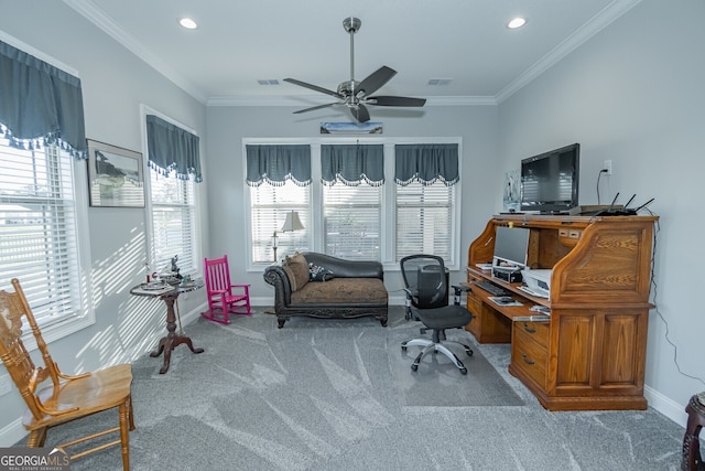 carpeted office space with ceiling fan and crown molding