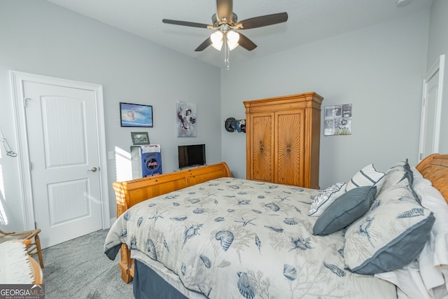 bedroom with ceiling fan and carpet