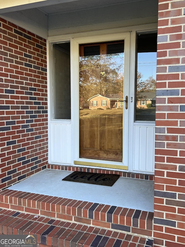 property entrance featuring french doors