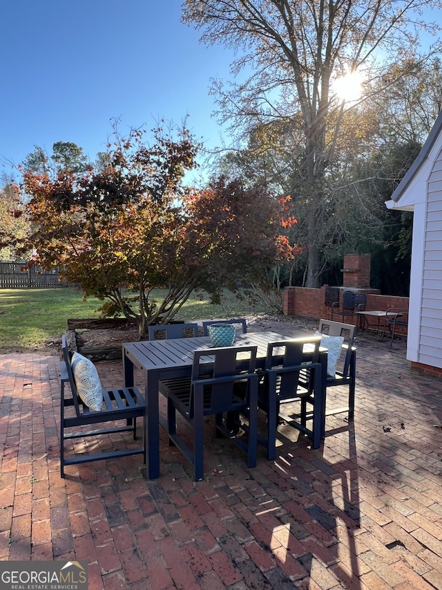 view of patio / terrace with an outdoor fireplace