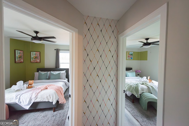 carpeted bedroom featuring ceiling fan