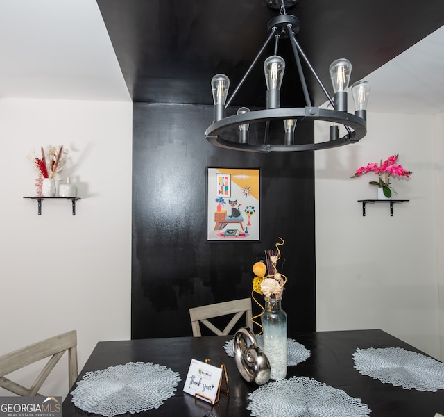 dining area featuring a chandelier