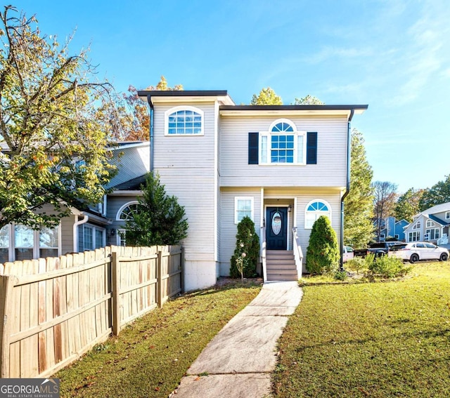 view of front facade with a front lawn