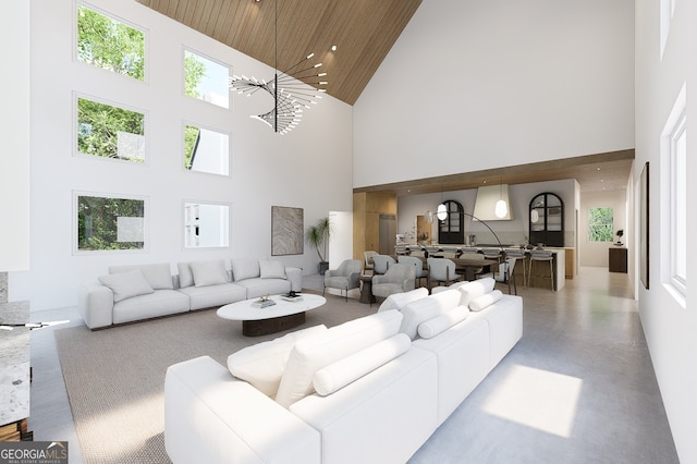 living room with an inviting chandelier, concrete flooring, high vaulted ceiling, and wooden ceiling