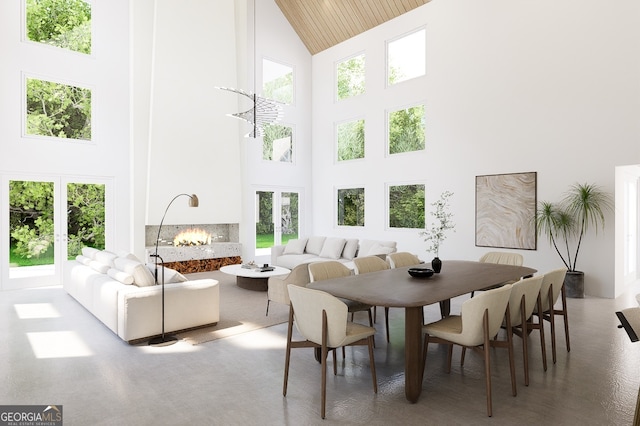 sunroom with lofted ceiling, wood ceiling, and french doors