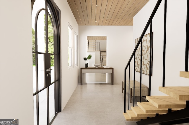 foyer entrance featuring wooden ceiling