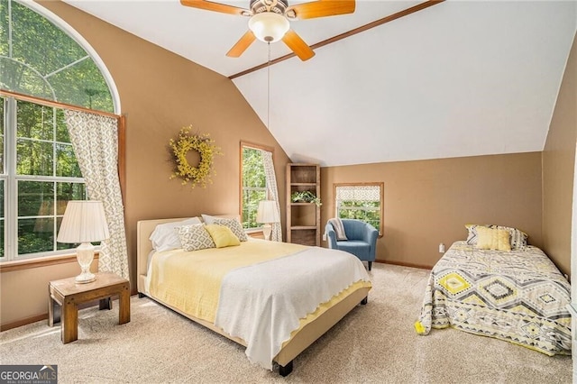 bedroom featuring ceiling fan, lofted ceiling, and light carpet