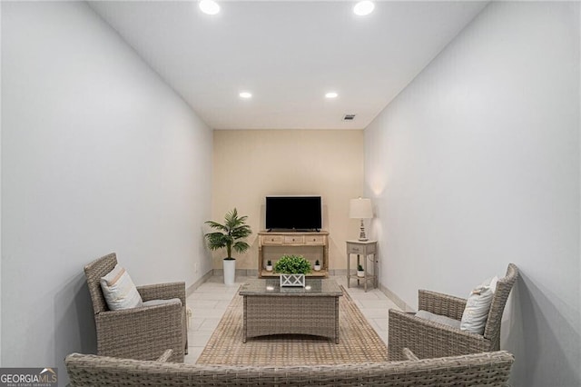 living room featuring light tile patterned floors