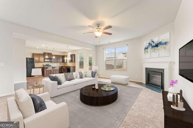 living room featuring ceiling fan