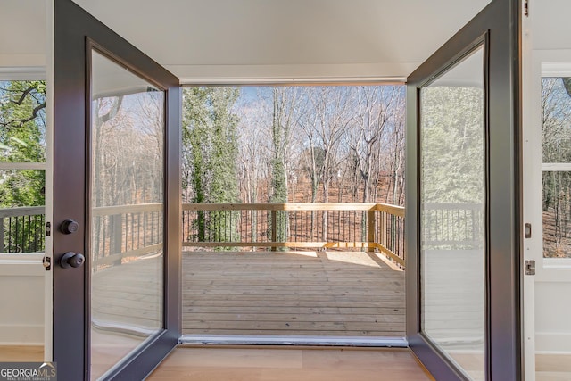 doorway to outside with light hardwood / wood-style flooring