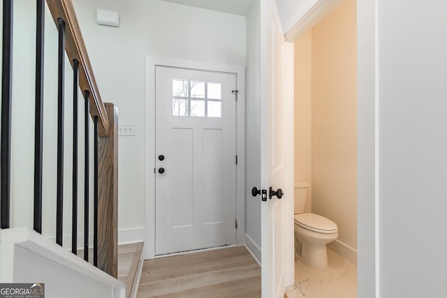 foyer with light hardwood / wood-style floors