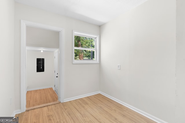 spare room featuring hardwood / wood-style floors