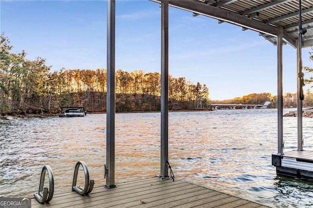 view of dock with a water view