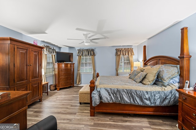 bedroom featuring ceiling fan and light wood-type flooring