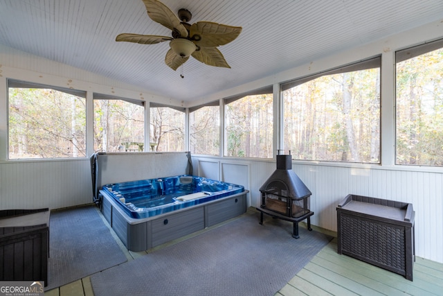 sunroom / solarium with ceiling fan