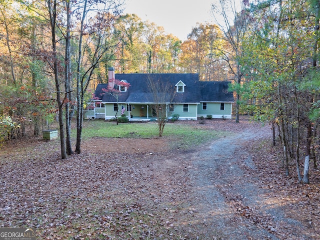 view of new england style home