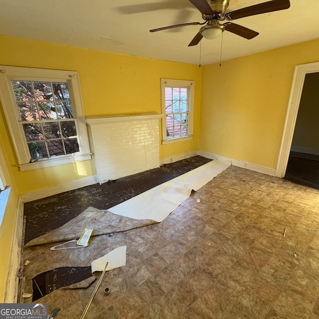 spare room with ceiling fan