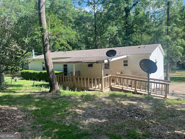 view of front of house with a deck