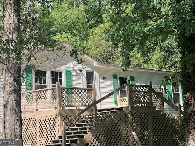 rear view of house with a deck