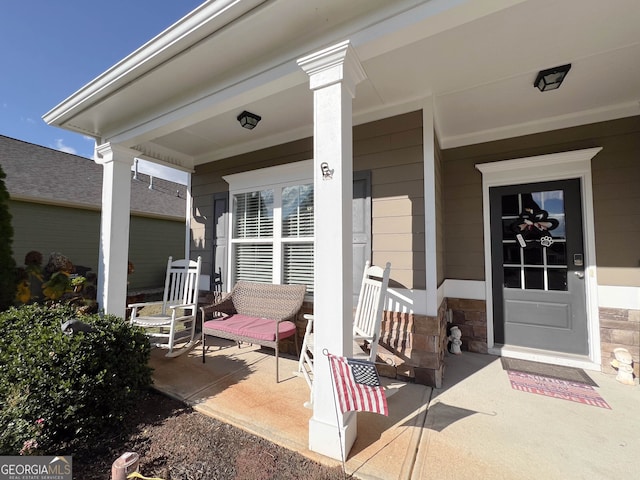 view of patio featuring a porch