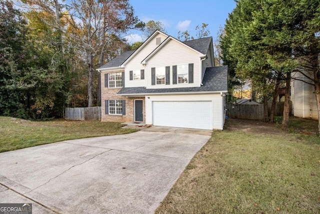 front facade featuring a front yard and a garage