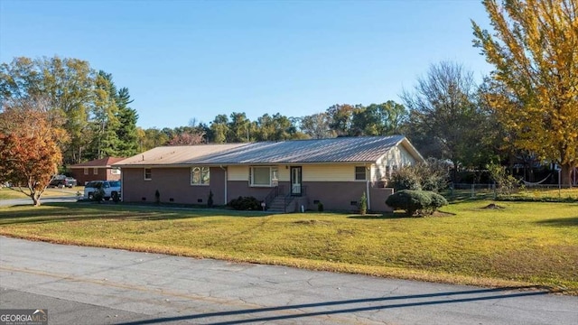 view of front of home with a front lawn