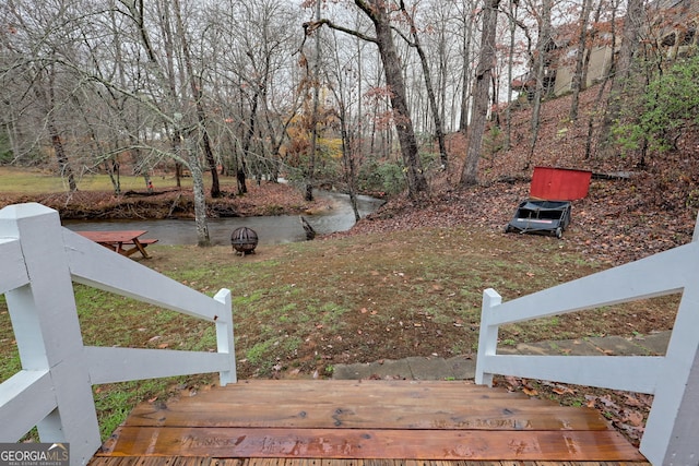 view of yard with a wooden deck