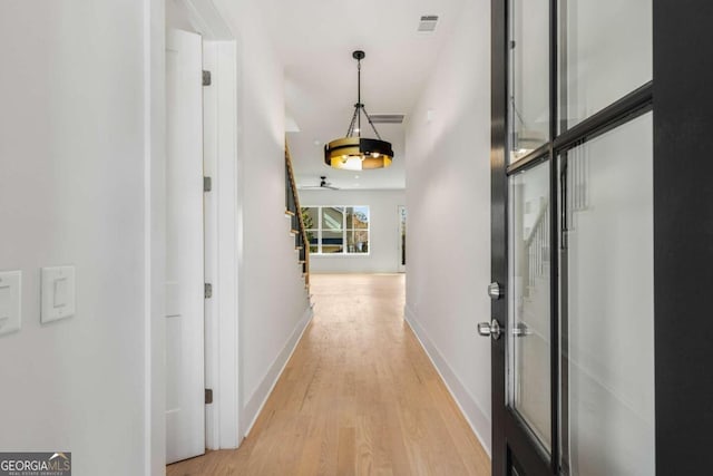 hall featuring light hardwood / wood-style flooring