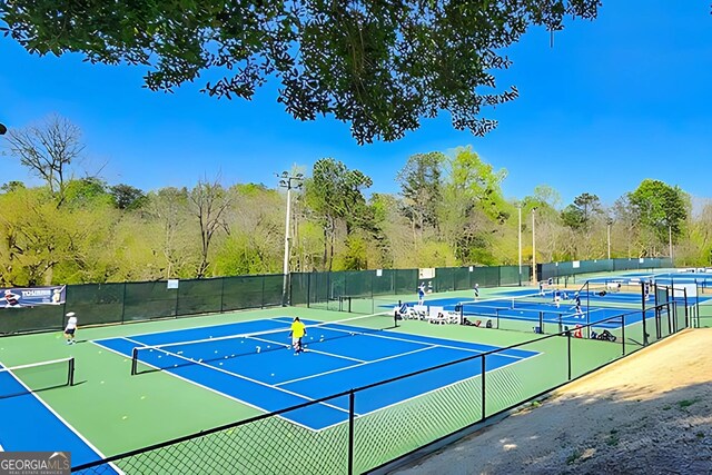 318 Sandy Springs Cir Unit 310, Atlanta, GA 30328 - view of tennis court featuring community basketball court
