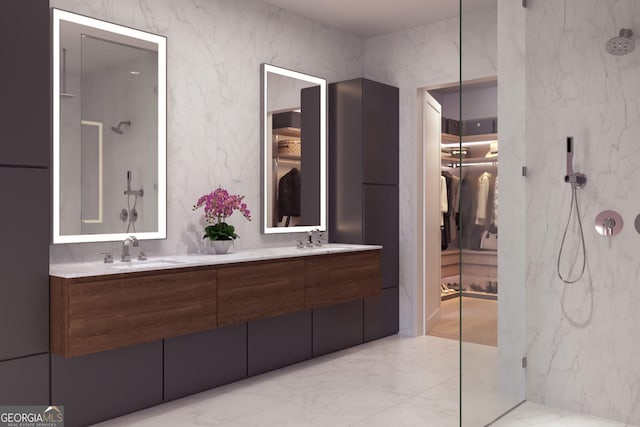 318 Sandy Springs Cir Unit 310, Atlanta, GA 30328 - full bath featuring marble tiled flooring, a marble finish shower, double vanity, and a walk in closet