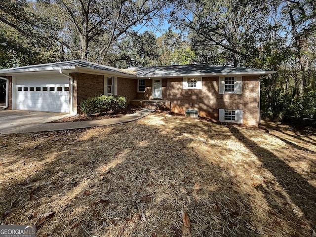 single story home featuring a garage