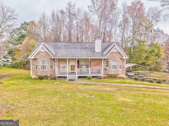 single story home featuring a front lawn, a carport, and a porch