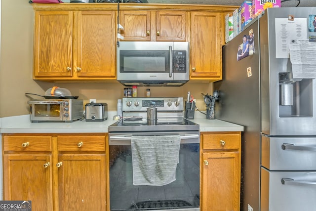 kitchen featuring appliances with stainless steel finishes