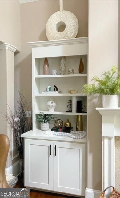 bar with white cabinetry