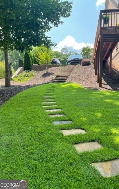 view of yard with a deck