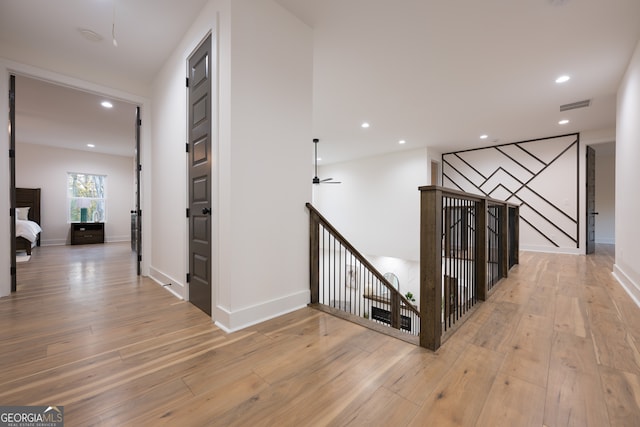 corridor featuring light hardwood / wood-style flooring