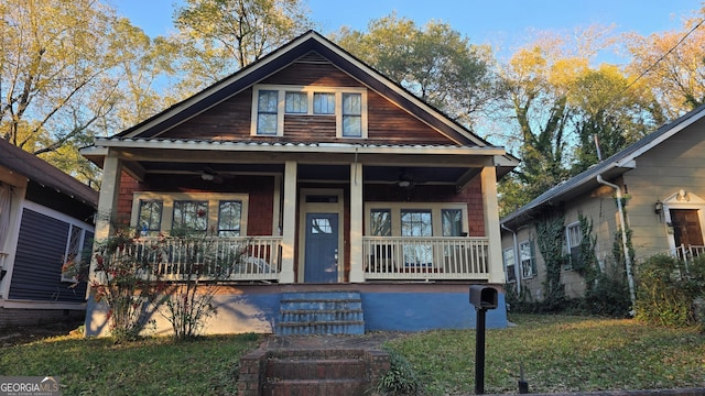 view of front of home featuring a porch and a front yard