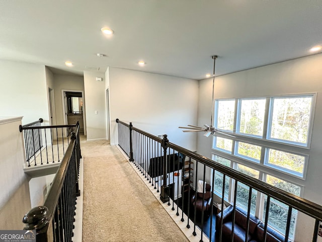 corridor featuring carpet flooring