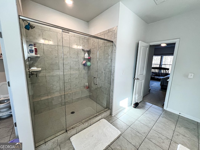 bathroom featuring tile patterned floors and walk in shower