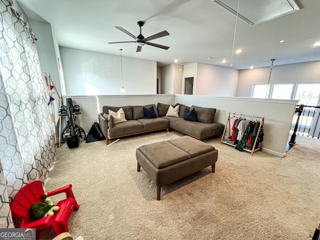 living room with ceiling fan and light carpet