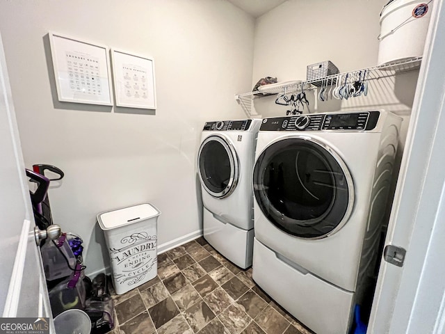 washroom with washing machine and dryer