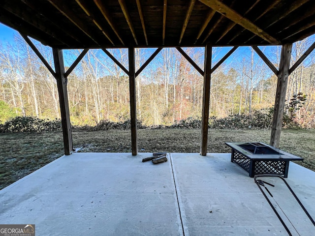 view of patio featuring an outdoor fire pit