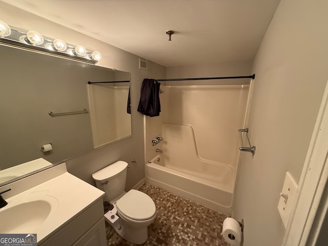 full bathroom with vanity, toilet, and tub / shower combination