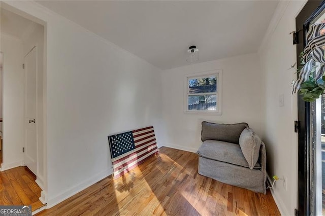 living area featuring hardwood / wood-style floors