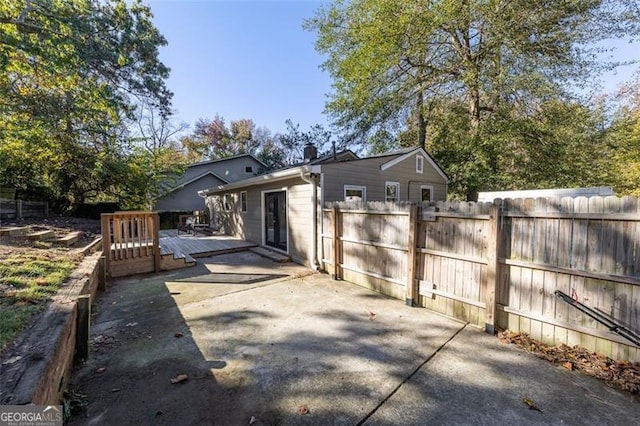 back of house with a patio