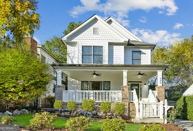 view of front facade featuring ceiling fan and a porch