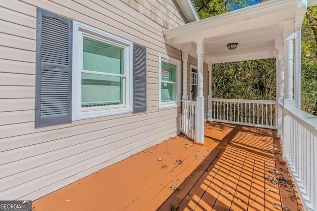 deck with covered porch